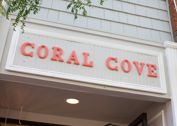 coral cove boutique sign