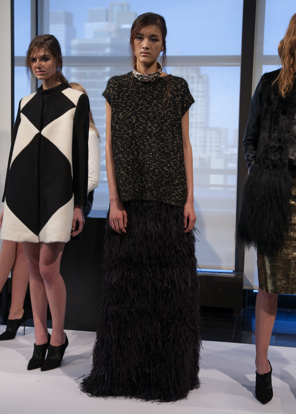 Black, gold and a feather maxi skirt at RAOUL Fall 2014 Presentation