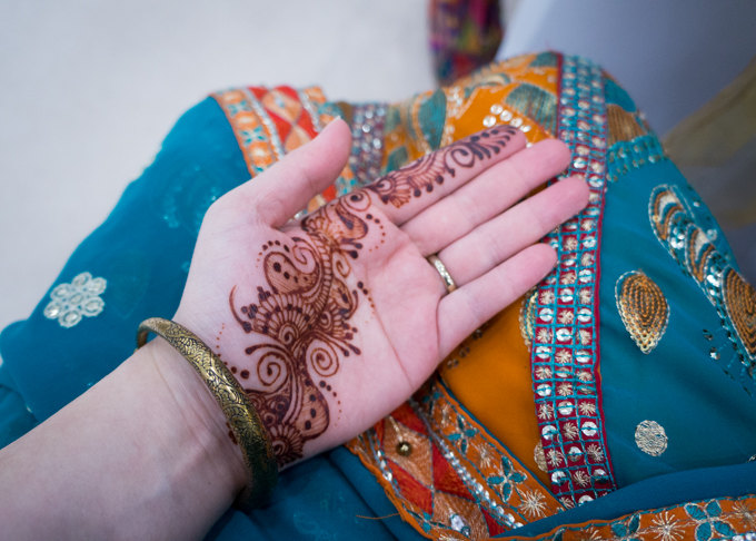Henna on palm and sari for a wedding