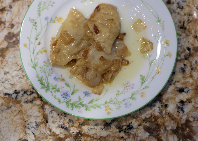 pierogies with butter and onions