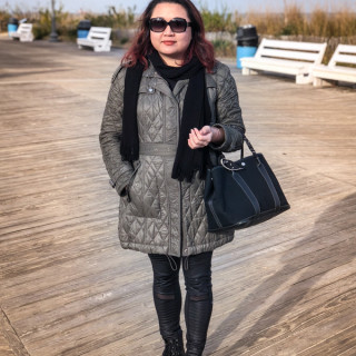 Standing on the boardwalk on a cold beach day