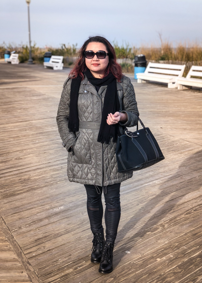 Standing on the boardwalk on a cold beach day